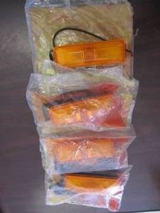 lot 1758 image: 4 New in Bag Peterson 4 Rectangle Amber ClearanceMarker  lights # 2637A