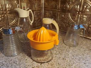 lot 3034 image: Lot of 5 Glass Kitchen Must Needs. 1 Juicer and 4 Syrup Dispensers.