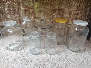 lot 3038 image: Lot of 7 Glass Containers and Canisters. SHATTO. 2 Ball Mason Jars. and More