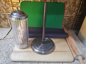 lot 3041 image: Lot of Kitchen Must Haves. Papetowel Holder. Wooden Rolling Pin. Wooden Cutting Board. Straw Canister and Cutting Matts for Counters