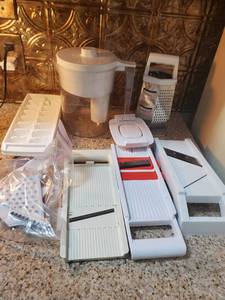 lot 3058 image: Lot of Plastic Ware for KITCHEN. Graters. Slices. BRITA Pitcher. and Ice Trays