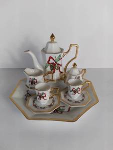 lot 2700 image: Miniature Tea Party Set For Two - Holiday Themed Red Bow with Bells - Gold Toned Accentes