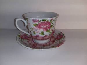 lot 2703 image: Porcelain Tea Cup And Saucer With Pink Lotus And Plaid Design