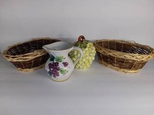 lot 2706 image: Lot Of 4 Items - 2 Small Whicker Baskets - Creamer Pitcher Hand Painted With Grapes Made In Italy - Grapes Shaped Sugar Dish