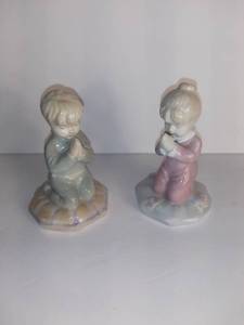 lot 2719 image: Lot Of 2 Porcelain Boy And Girl Praying Figurines