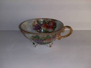 lot 2723 image: Vintage Footed Tea Cup With Fruit And Good Toned Accents with Opalescent Finish