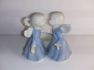 lot 2728 image: Porcelain Boy And Girl Angel Kissing Candle Holder