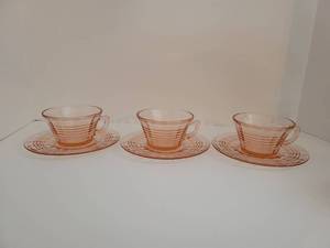 lot 272 image: Set of 3 Pink Depression Anchor Hocking Teacups and Saucers