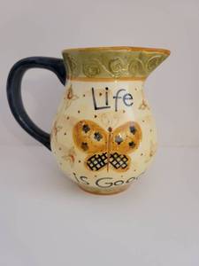 lot 2521 image: Homestyle Ceramic- Karen Hillard Crouch qLife is Good Butterfly Pitcher - Small Chip on Rim
