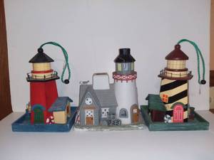 lot 4522 image: 3 Decorative Lighthouses. 2 Wood 1 Ceramic