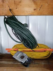 lot 1603 image: Lot Of 2 Heavy Duty Extension Chords One Green One Yellow With Socket Box