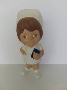 lot 5013 image: Atlantic Mold Ceramic Nurse Figure