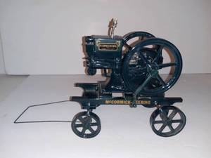 lot 6029 image: Ertl McCormick-Deering Hit and Miss Hit Air EngineDiecast Toy