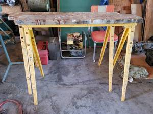 lot 7209 image: Pair of WoodenYellow Metal Base Saw Horses