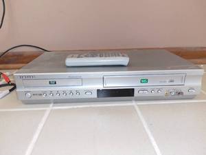 lot 7253 image: Samsung DVD-V4600 Dual DVDVHS Player With Remote