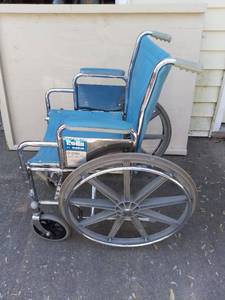 lot 9202 image: Blue Invacare Wheelchair