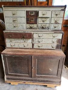 lot 177 image: Antique Globe Tool Chest with 18 Individual Top Drawrs woth Brass Handles. Lower Storage Cabinet with Wheels.