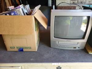 lot 10002 image: Small Toshiba. Game TV. with VCR . VHS Tapes Included
