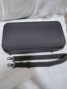 lot 29018 image: Hard Travel Black Case WCarrier Strap