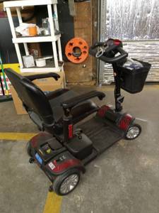 lot 1023 image: Drive Medical Electric Wheelchair with Interchangable Color Scheme Pieces Red to Blue