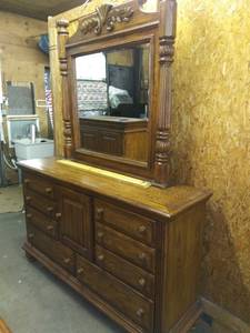 lot 1032 image: Wood 8 Drawer Dresser 38 x 64 x 18 in with Mirror 46 x 46 x 4.5 in
