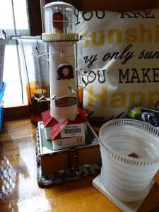 lot 19671 image: Battery Operated Light House  Candles and Pillow