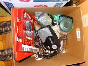 lot 19680 image: Camping Light  Radio and Piano Lesions and Misc Electrical Stuff