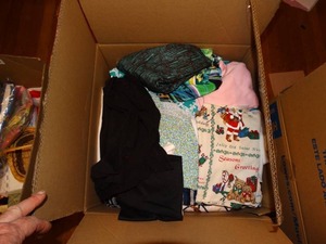 lot 19808 image: Box Full Of a Variety of Quilting Fabric