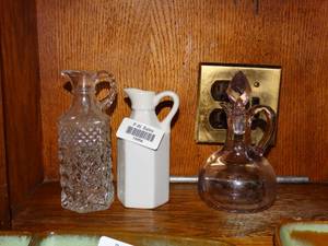 lot 19954 image: Three small glassware pitchers on kitchen shelf