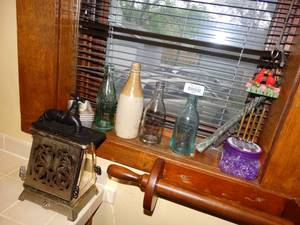 lot 19967 image: Cool Little Collection  Old Toaster  Bottles  Cheese Cutters and Misc