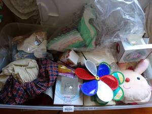 lot 35202 image: Holiday decor pieces, older handmade dolls, some fabric and much more