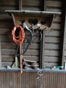 lot 35240 image: Wood Shelf with Extension Cord, Saw, Garden Tools, Etc
