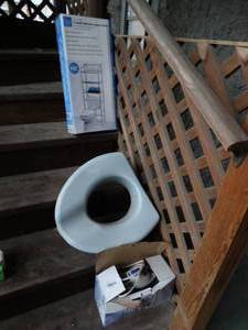 lot 35242 image: Bathroom Shelf, Toilet Set Elevator, and Steam Iron
