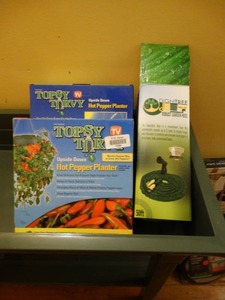 lot 19996 image: Topsy Turvy planters and expanding gardening hose