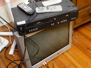 lot 35007 image: VHS  DVD Player and Original Flat Screen TV
