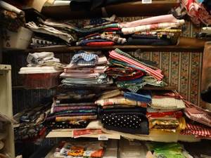 lot 35028 image: Huge Lot of Fantastic Quilting & Sewing Fabrics - Many Coordinating Colors for Blocking & Art Quilting