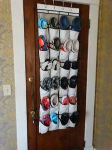lot 35078 image: Over the Door Shoe Organizer with Assorted Shoes