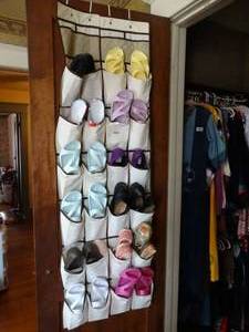 lot 35081 image: Over the Door Shoe Organizer with Assorted Shoes