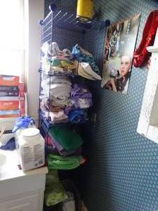 lot 35225 image: Lot of Assorted Towels and Rags with Blue Wire Shelf
