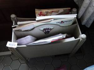 lot 35230 image: Lot of Misc. Magazines and Book with White Magazine Holder