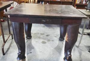 lot 1412 image: 75 years old Rolling Table made with organ legs has one drawer