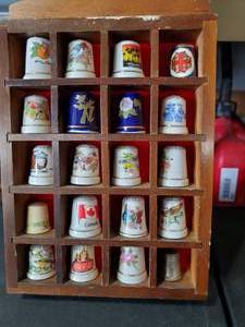 lot 1475 image: 20 Thimbles and shelf
