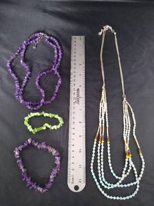 lot 1604 image: Costume jewelry necklaces and bracelets