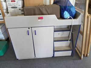 lot 27522 image: Baby Changing Station With Portable Crib