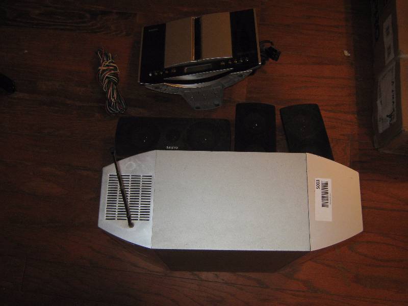 lot 5003 image: Sanyo Home Theater System CD DVD Player Stereo with sub woofer and right, left, center channel speakers, used