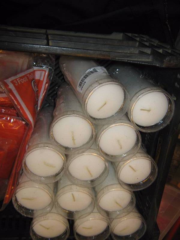 lot 5030 image: 13 ct. lot Emkay unscented white pillar candles w molded plastic covers, cross symbol