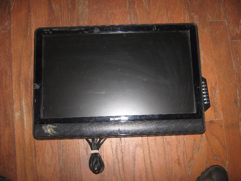 lot 5032 image: Sceptre 23 monitor TV, no base can be mounted to wall, used- powers on, works