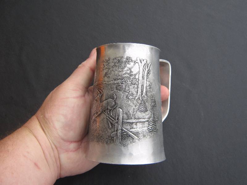 lot 5069 image: Handmade Wendell August Forge Woodland Deer Scene Metal Stein