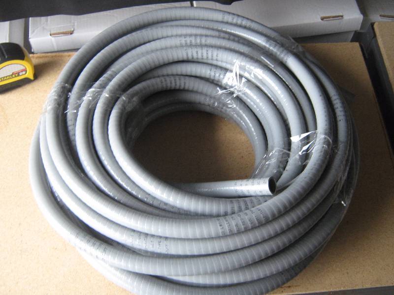 lot 5112 image: Roll of 12 liquid tuff direct burial CSA LL 69271 flex conduit, unknown length, approx. 50 ft.