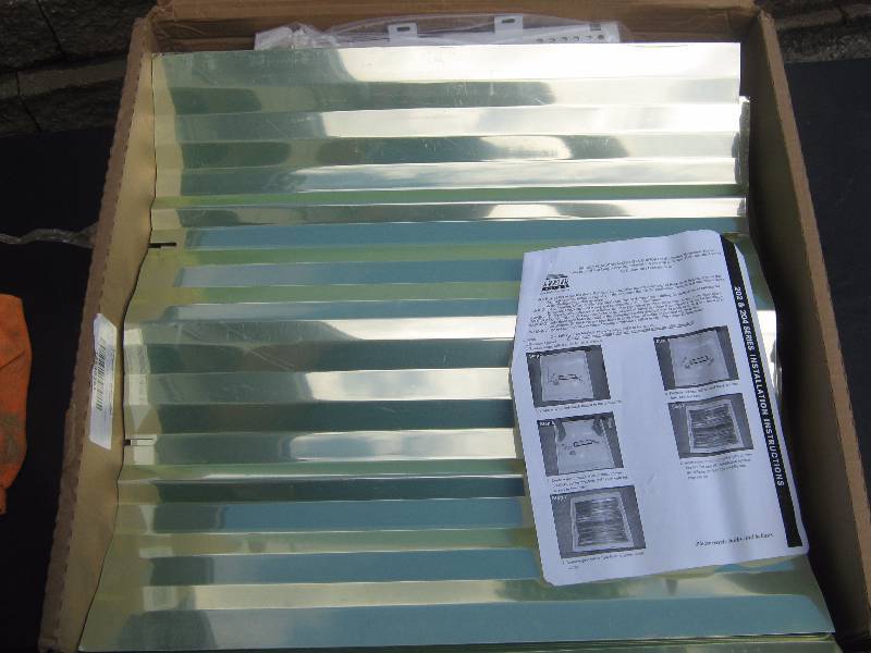 lot 5153 image: Lithonia Lighting reflective Kit for 2 x 2 lights, 4 ct. lot